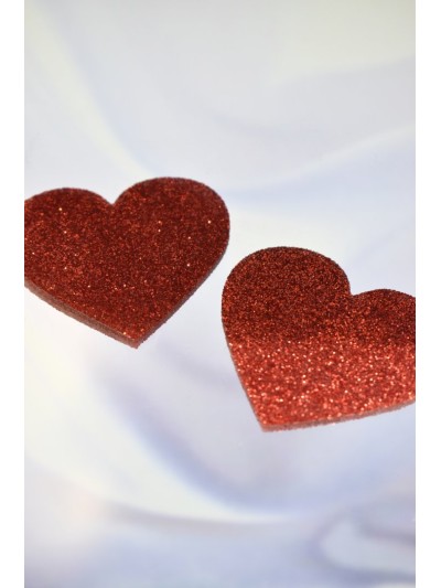 Paire de cache tétons adhésifs coeur pailleté rouge 