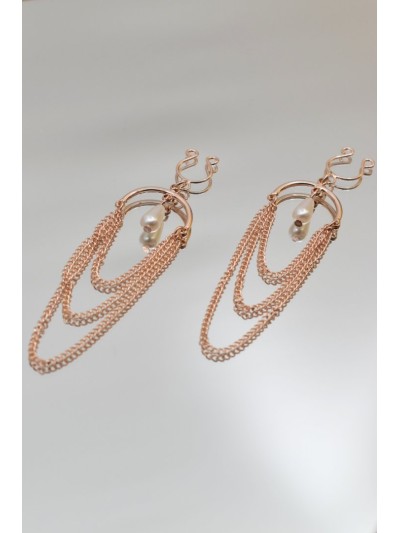 Bijoux de seins avec 3 chainettes doré rose et une perle 